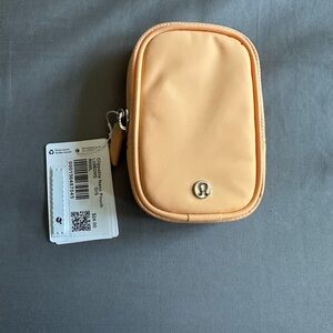 Lululemon Peach Pouch Nano clippable pouch.